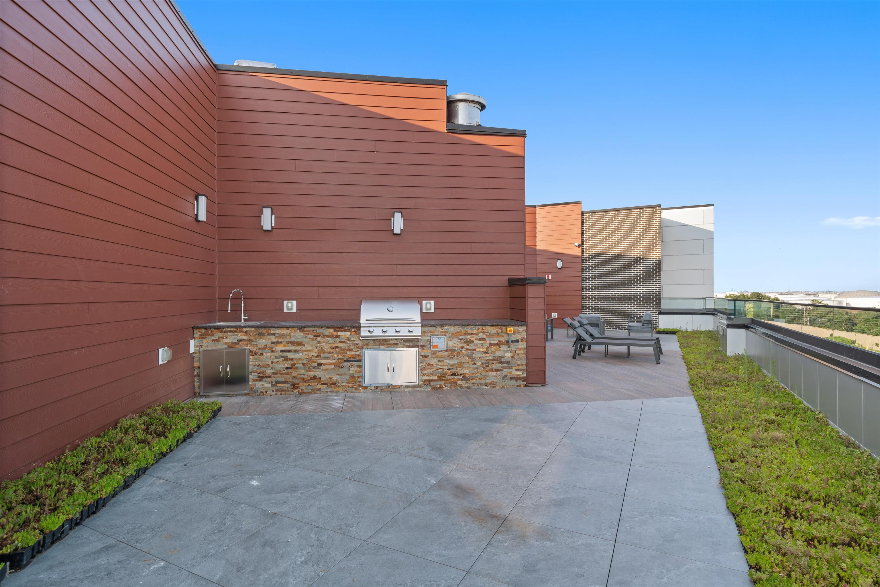 17 Ave East, Unit 504 Bayonne, NJ 07002 - Photo 22 of 30 a view of a terrace with sitting area