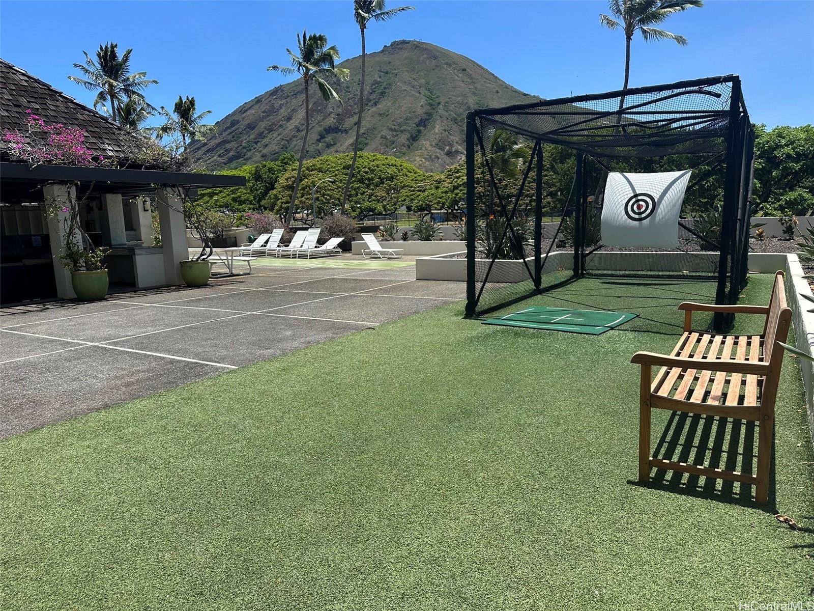 500 Lunalilo Home Road, Unit 22C Honolulu, HI 96825 - Photo 24 of 25 Practice your swing! Golf cage and putting green.