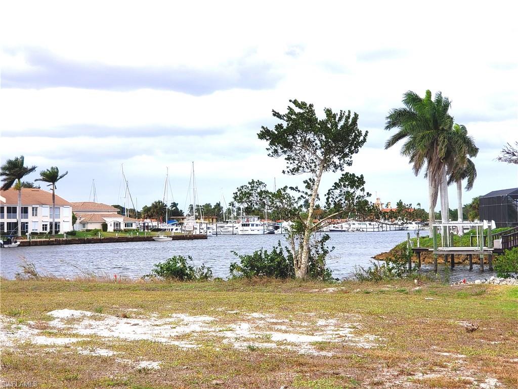 149 Venus Cay Naples, FL 34114 - Photo 11 of 21 a view of a swimming pool and lake view