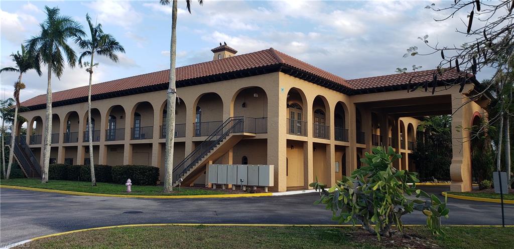 149 Venus Cay Naples, FL 34114 - Photo 18 of 21 a house view with a garden space