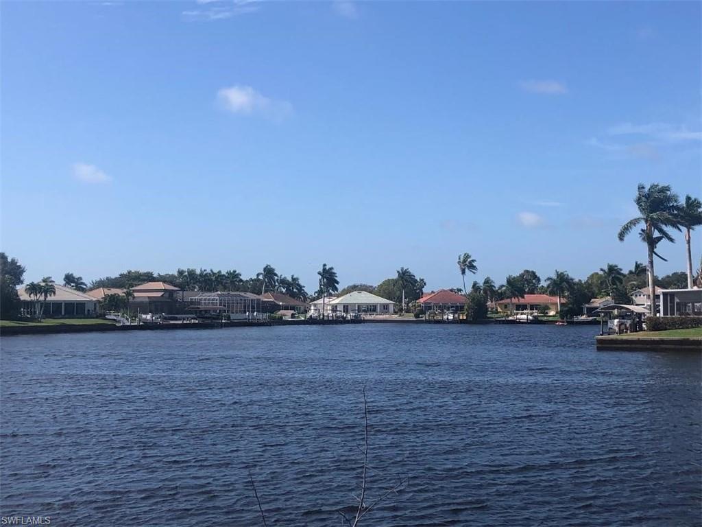149 Venus Cay Naples, FL 34114 - Photo 3 of 21 a view of a lake