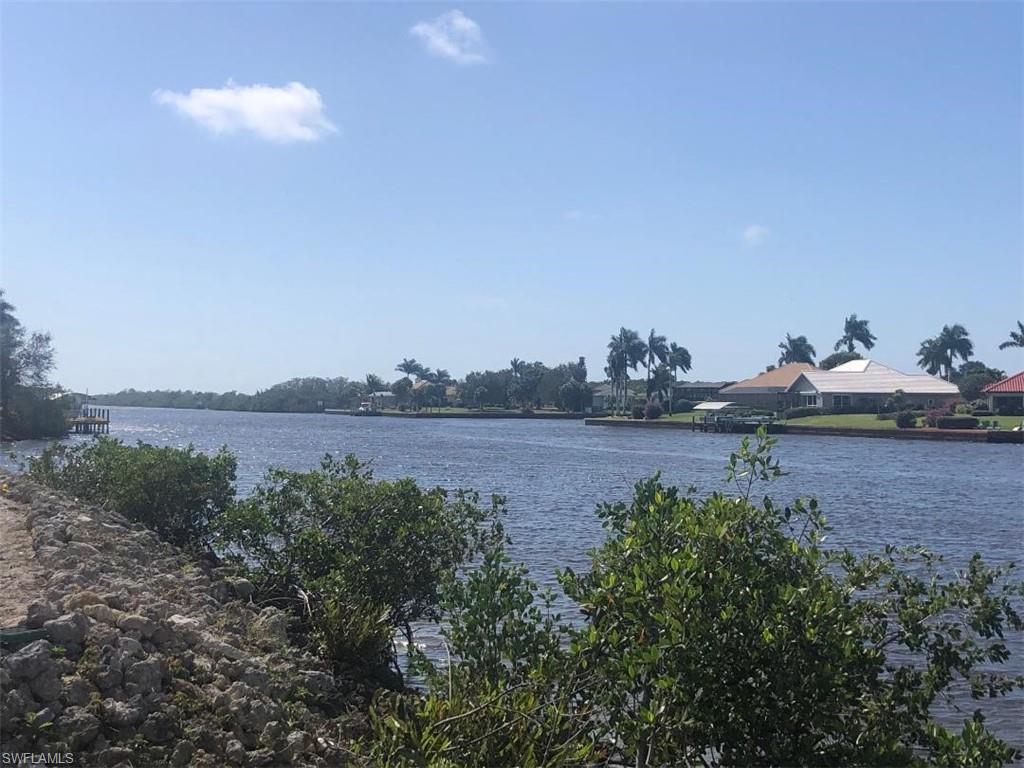 149 Venus Cay Naples, FL 34114 - Photo 4 of 21 a view of a lake