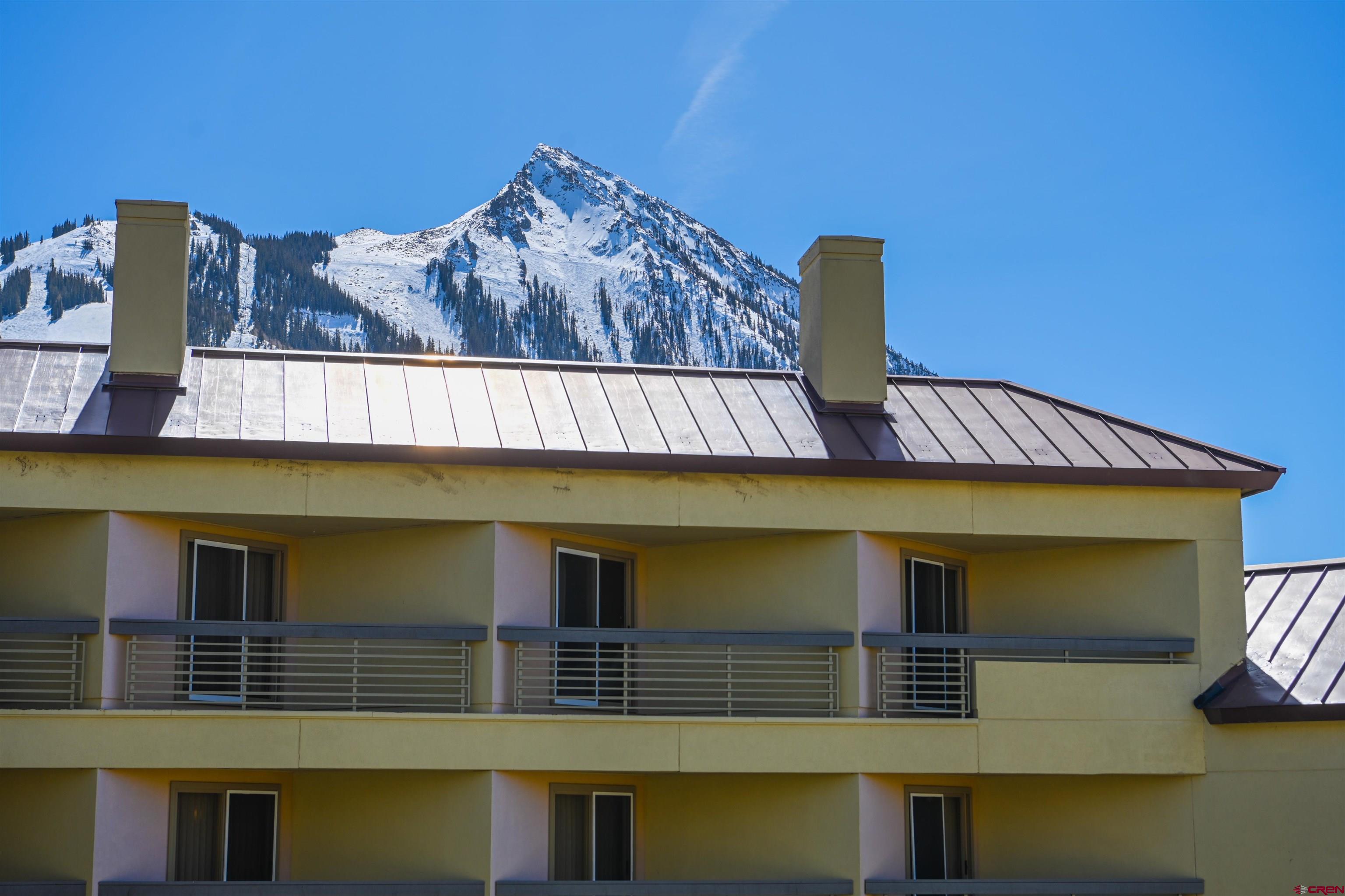 500 Gothic Road, Unit 522 Crested Butte, CO 81225 - Photo 21 of 24 a front view of a house with a yard