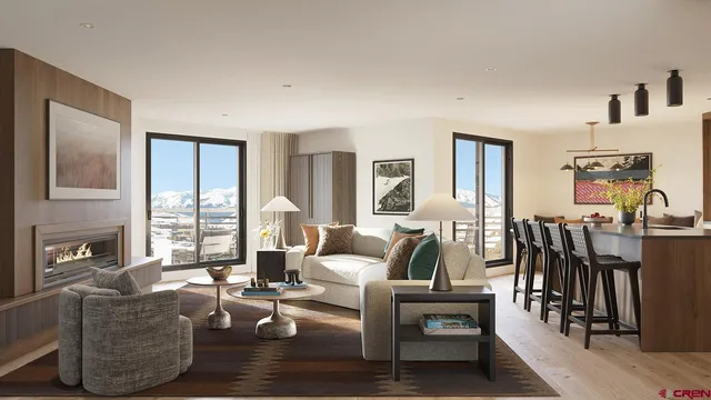 a living room with furniture fireplace and flat screen tv