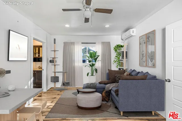 a living room with furniture and a couch