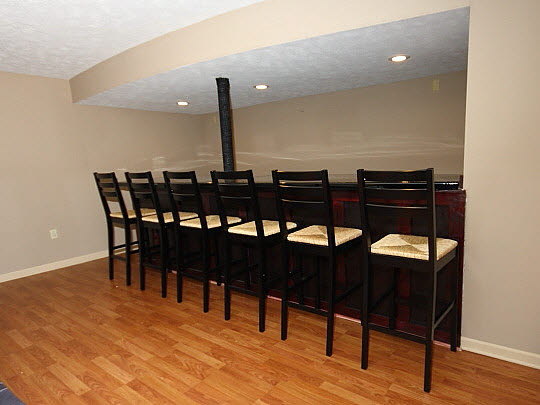 11601 East Kyte Road Rochelle, IL 61068 - Photo 8 of 11 a view of a dining room with furniture and wooden floor