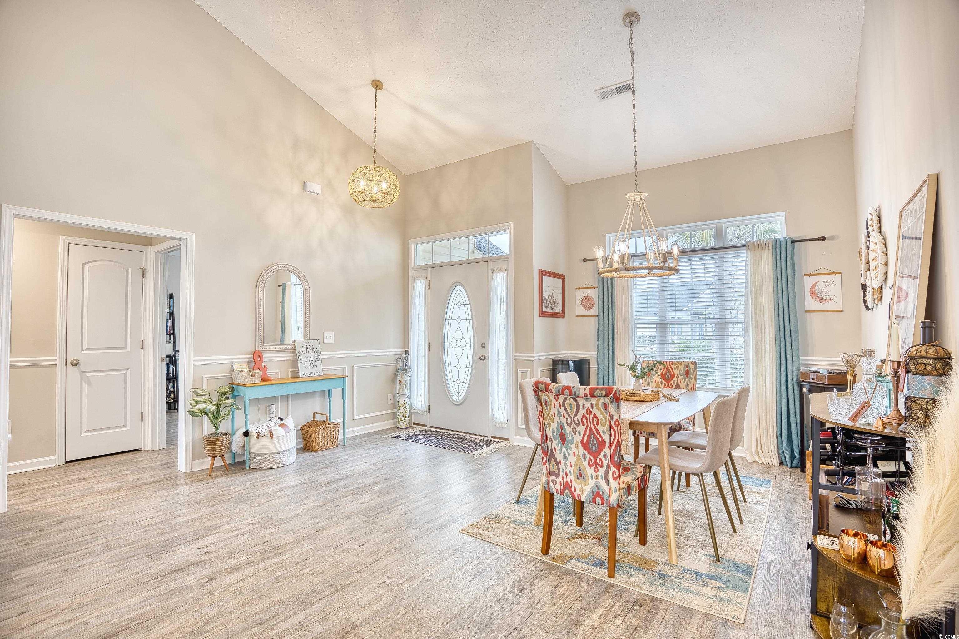 520 Hobie Cat Road Myrtle Beach, SC 29588 - Photo 14 of 40 Dining space with a notable chandelier, a healthy
