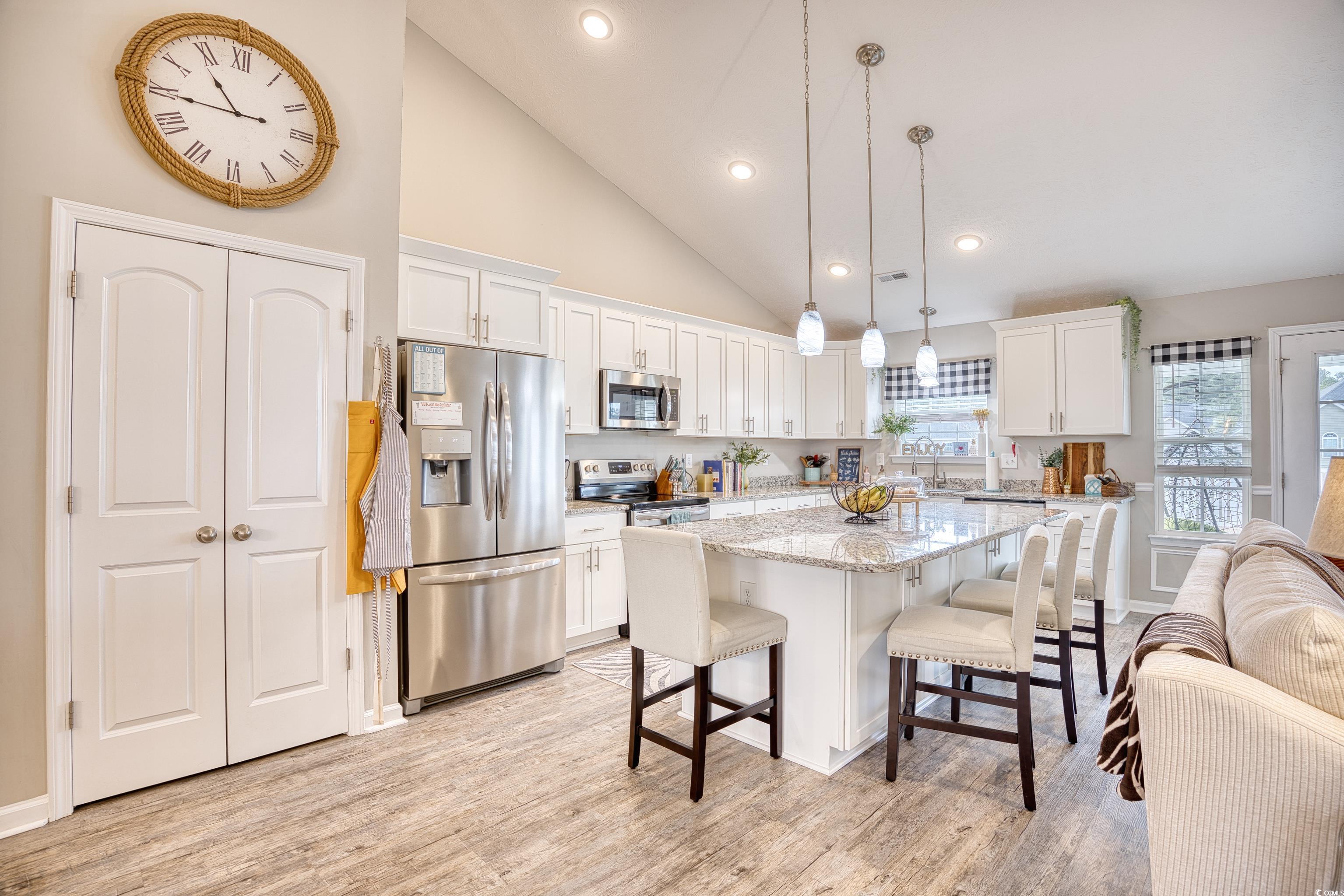 520 Hobie Cat Road Myrtle Beach, SC 29588 - Photo 19 of 40 Kitchen with stainless steel appliances, white cab