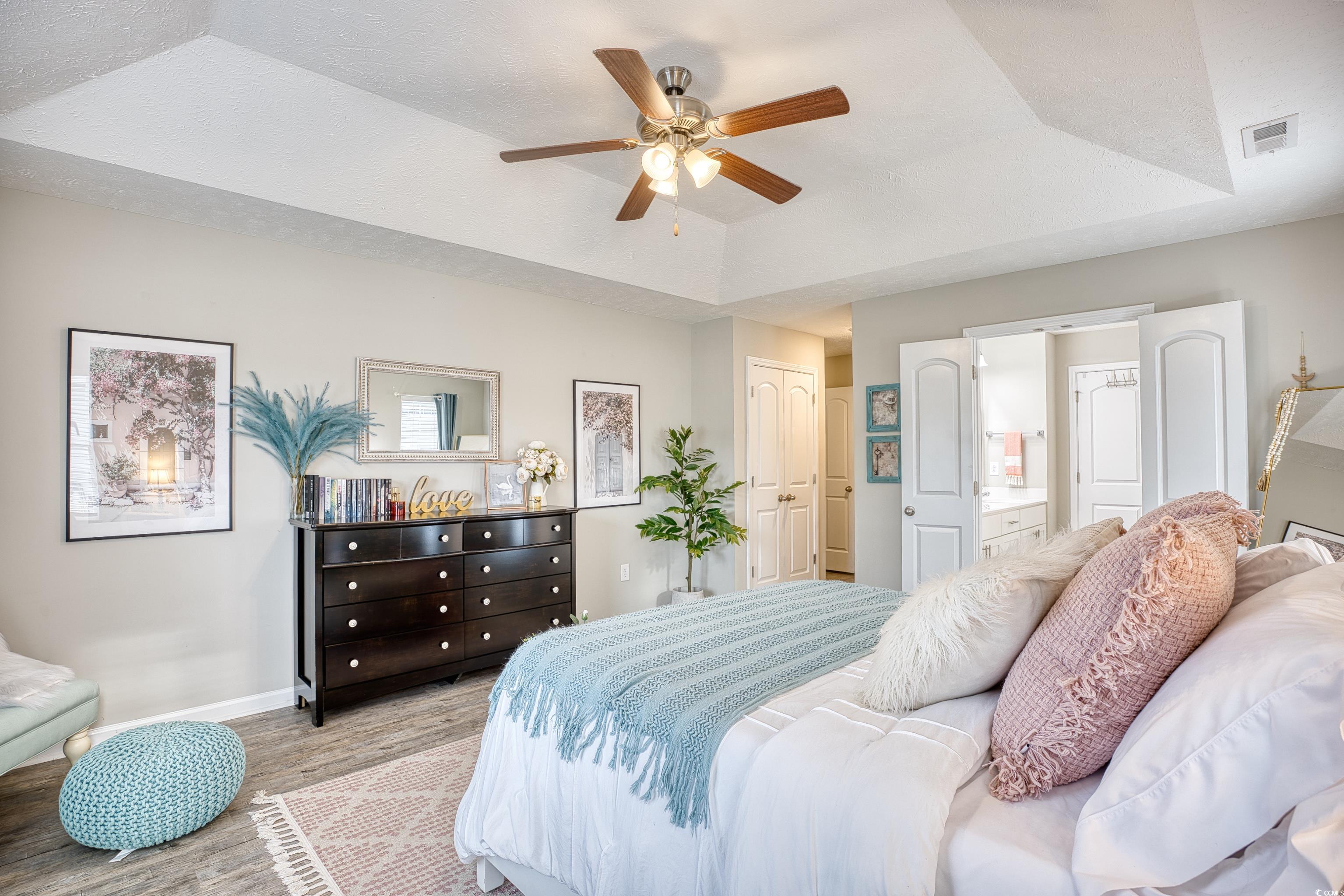 520 Hobie Cat Road Myrtle Beach, SC 29588 - Photo 32 of 40 Bedroom featuring ceiling fan, ensuite bath, light