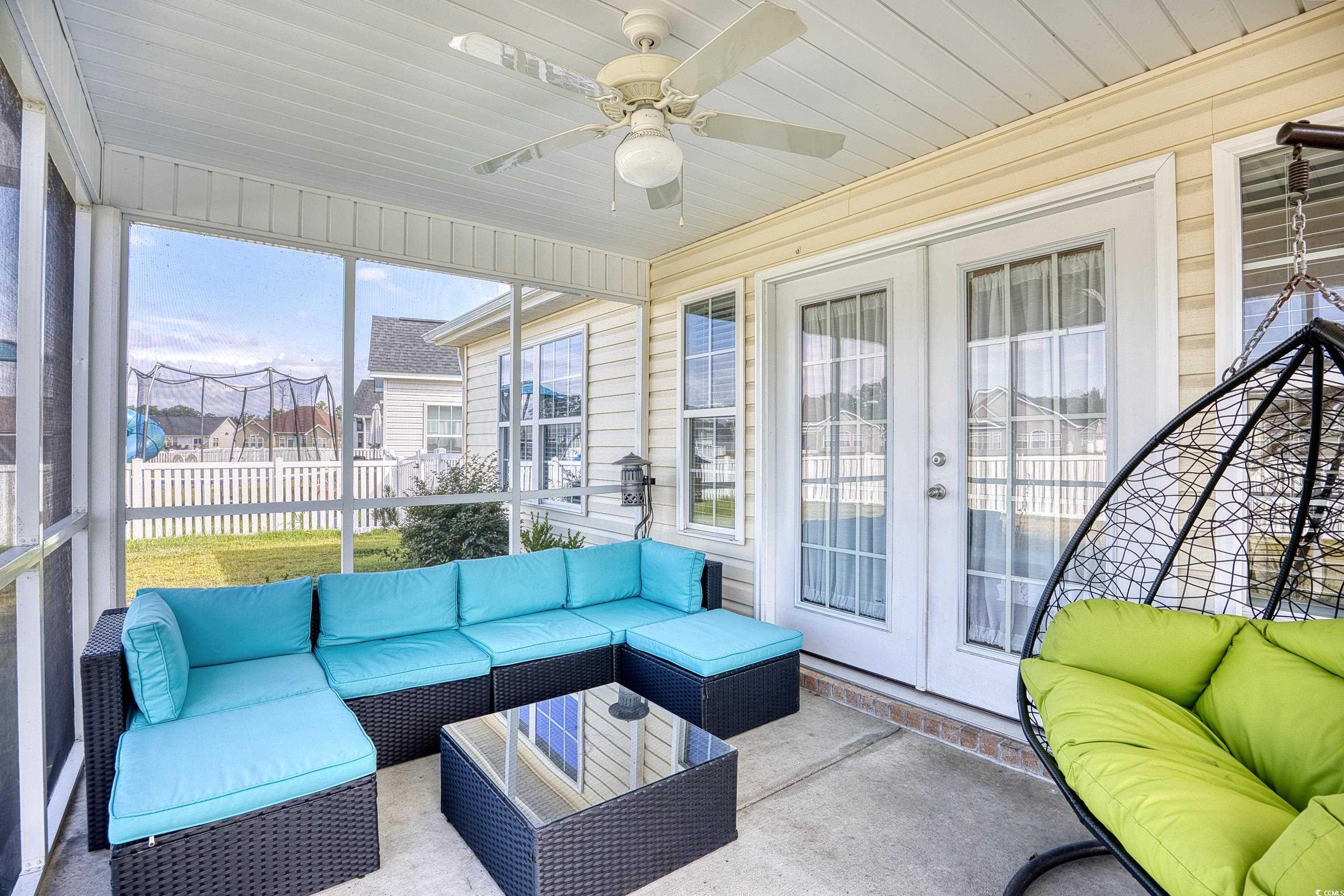 520 Hobie Cat Road Myrtle Beach, SC 29588 - Photo 38 of 40 Sunroom with ceiling fan