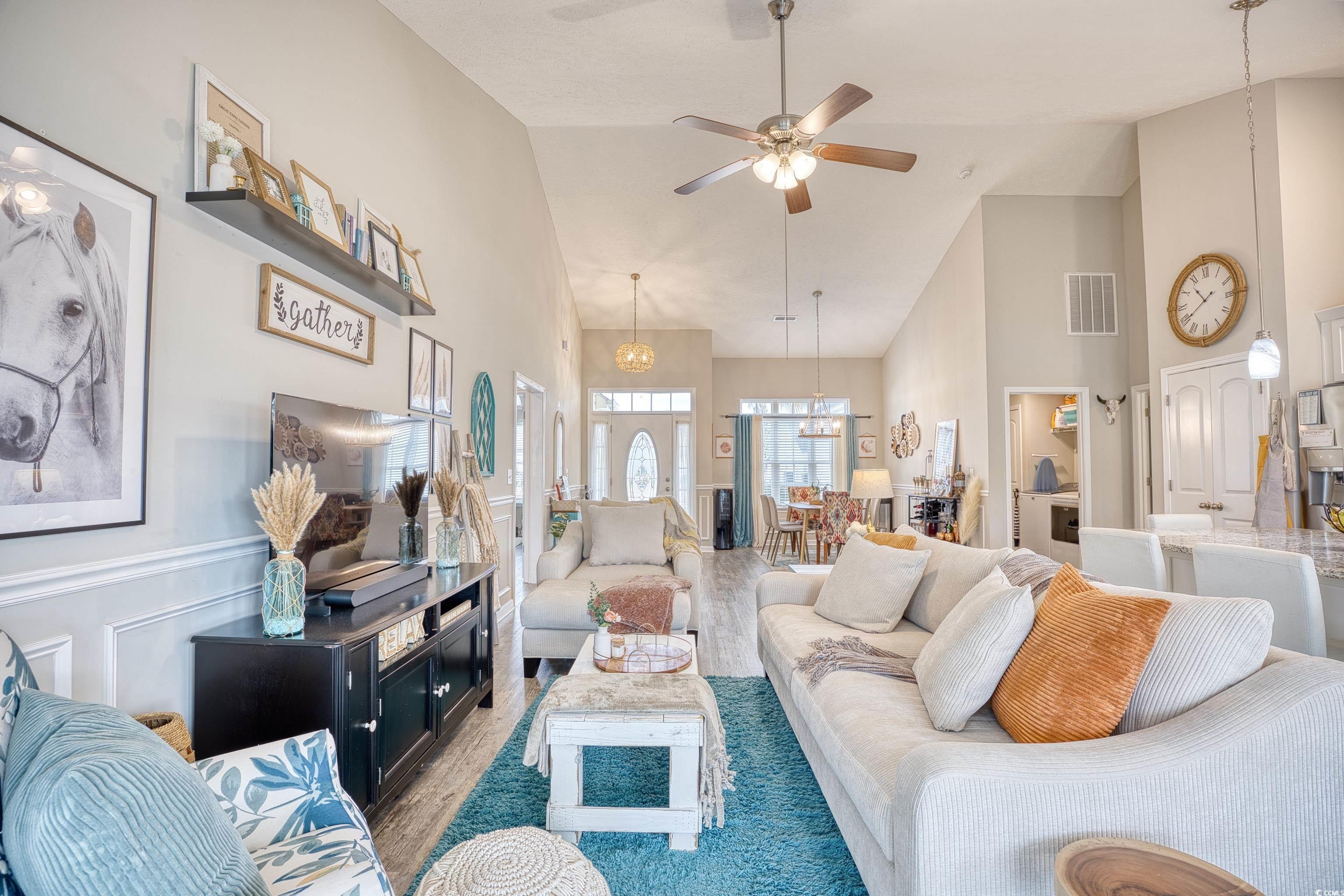 520 Hobie Cat Road Myrtle Beach, SC 29588 - Photo 10 of 40 Living room featuring high vaulted ceiling, ceilin