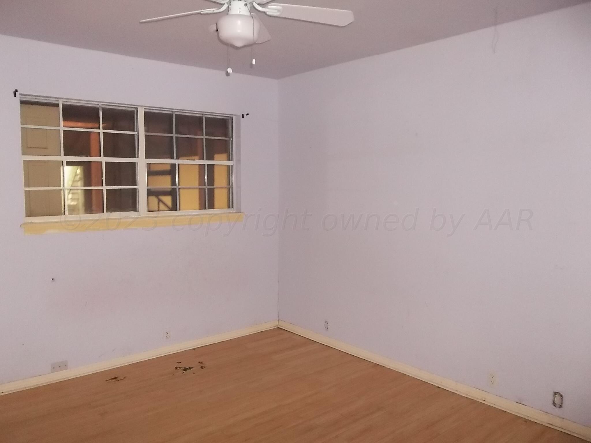6700 Jameson Road Amarillo, TX 79106 - Photo 39 of 41 an empty room with a window
