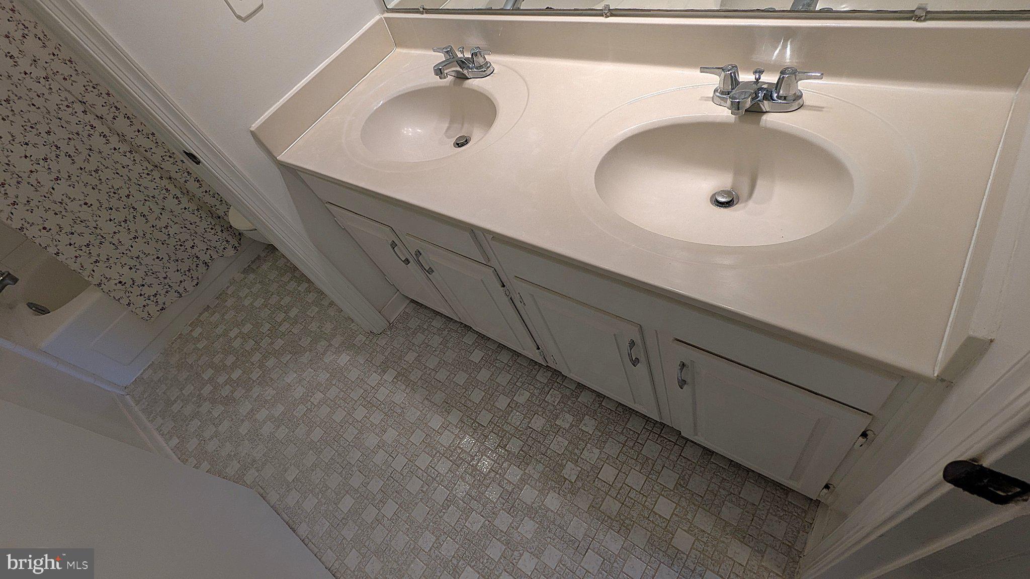 1835 Batten Hollow Road Vienna, VA 22182 - Photo 32 of 50 Elegant dual sink bathroom oasis.