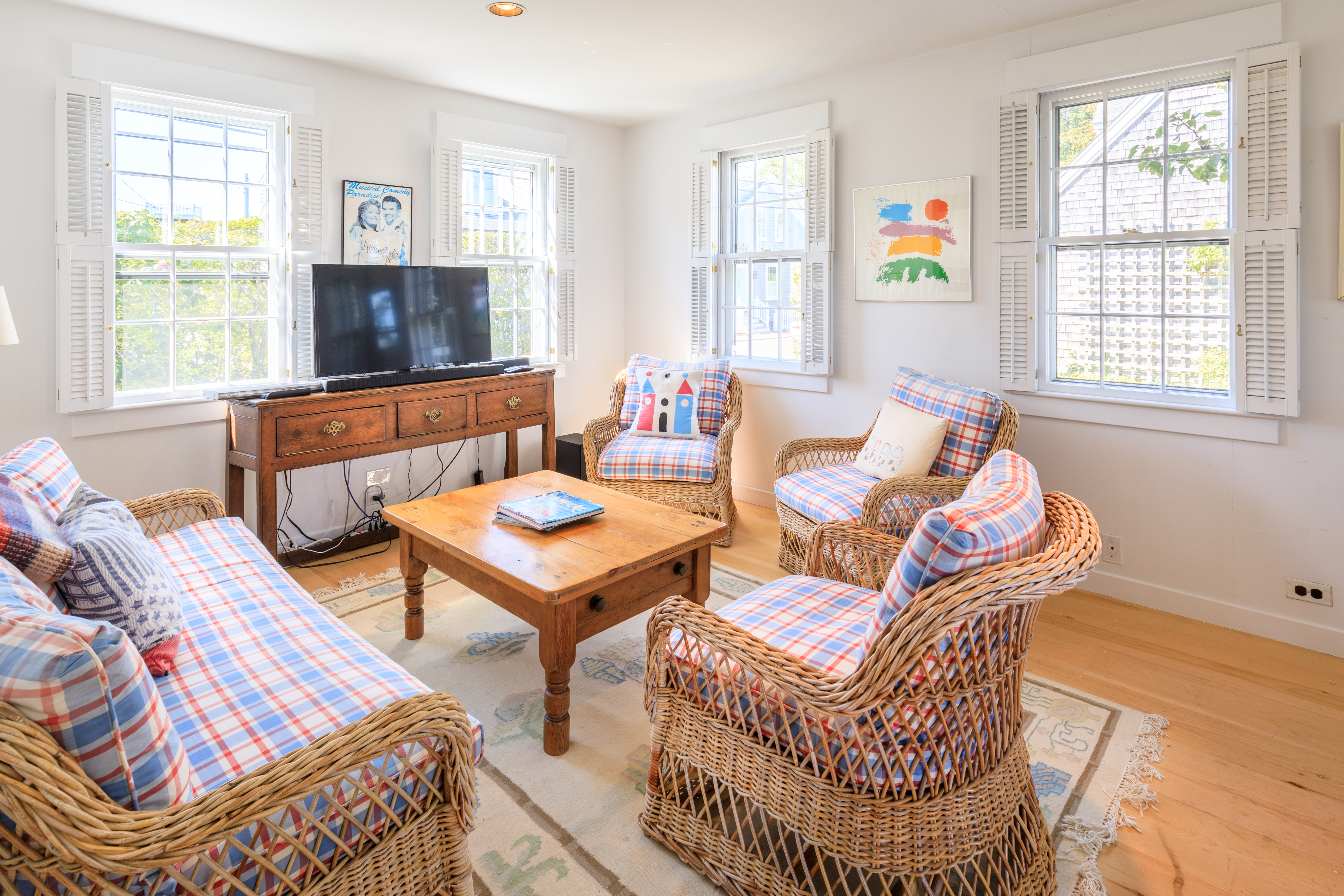 33 Cliff Road Nantucket, MA 02554 - Photo 57 of 84 a living room with furniture a flat screen tv and a window