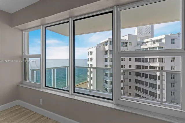 a kitchen with stainless steel appliances granite countertop a stove and a microwave