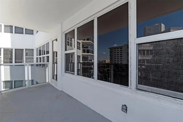 a view of balcony with an ocean