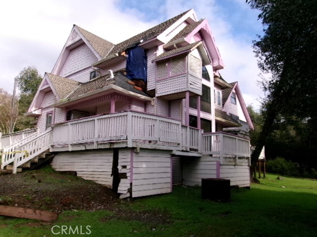 17392 Cache Creek Road Clearlake Oaks, CA 95423 - Photo 2 of 25 a view of a house with a yard