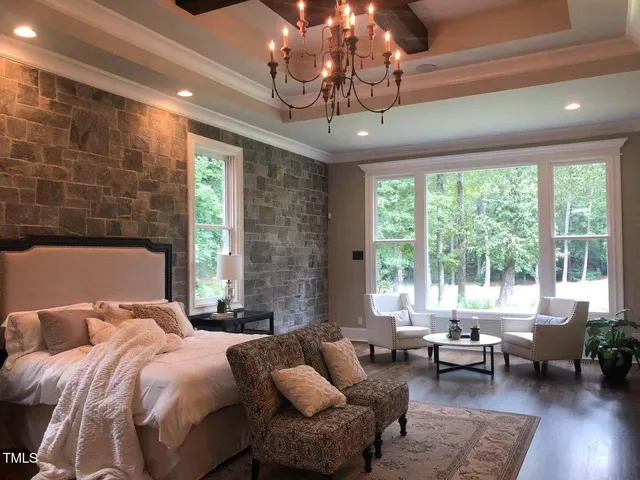 a bed room with a bed and a couch