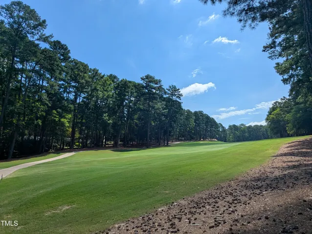 a view of a golf course with a yard