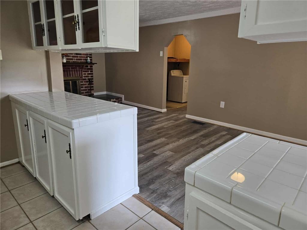2907 Oneida Valley Road Hilliards, PA 16040 - Photo 12 of 42 a kitchen with a refrigerator and a stove