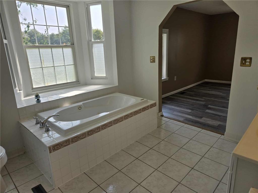 2907 Oneida Valley Road Hilliards, PA 16040 - Photo 18 of 42 a bath tub sitting next to a window