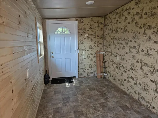 en empty room with brick walls