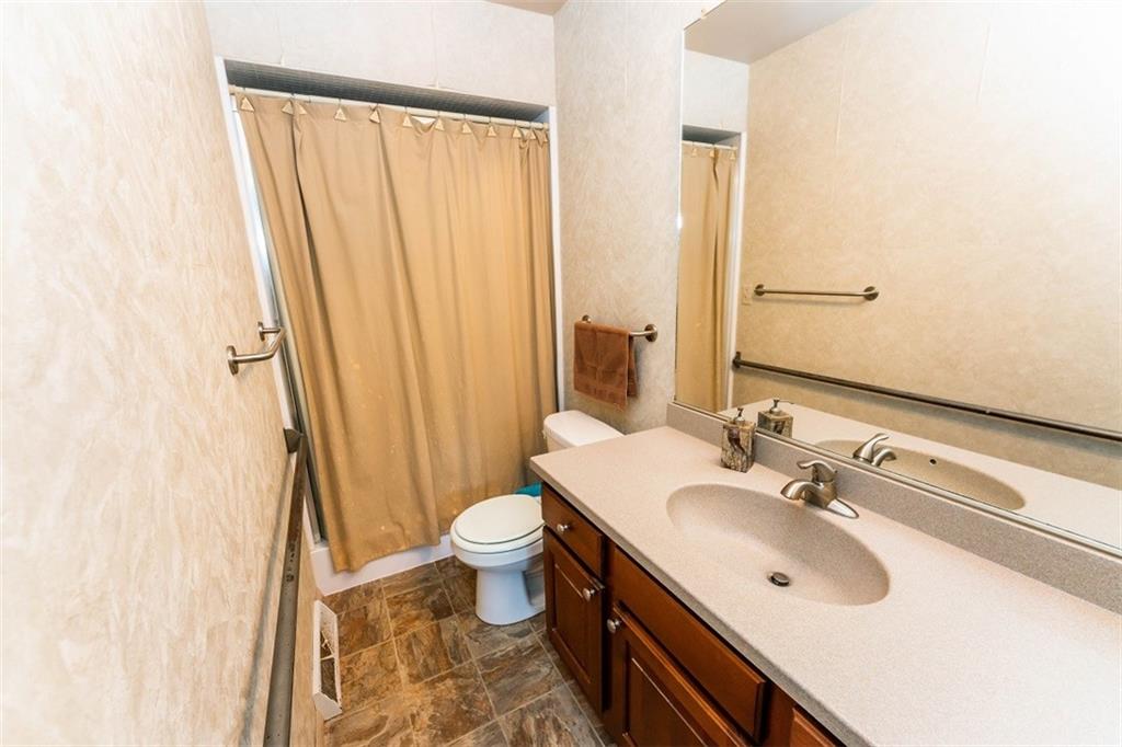 1000 Indian Springs Road Indiana, PA 15701 - Photo 11 of 22 a bathroom with a sink and a mirror