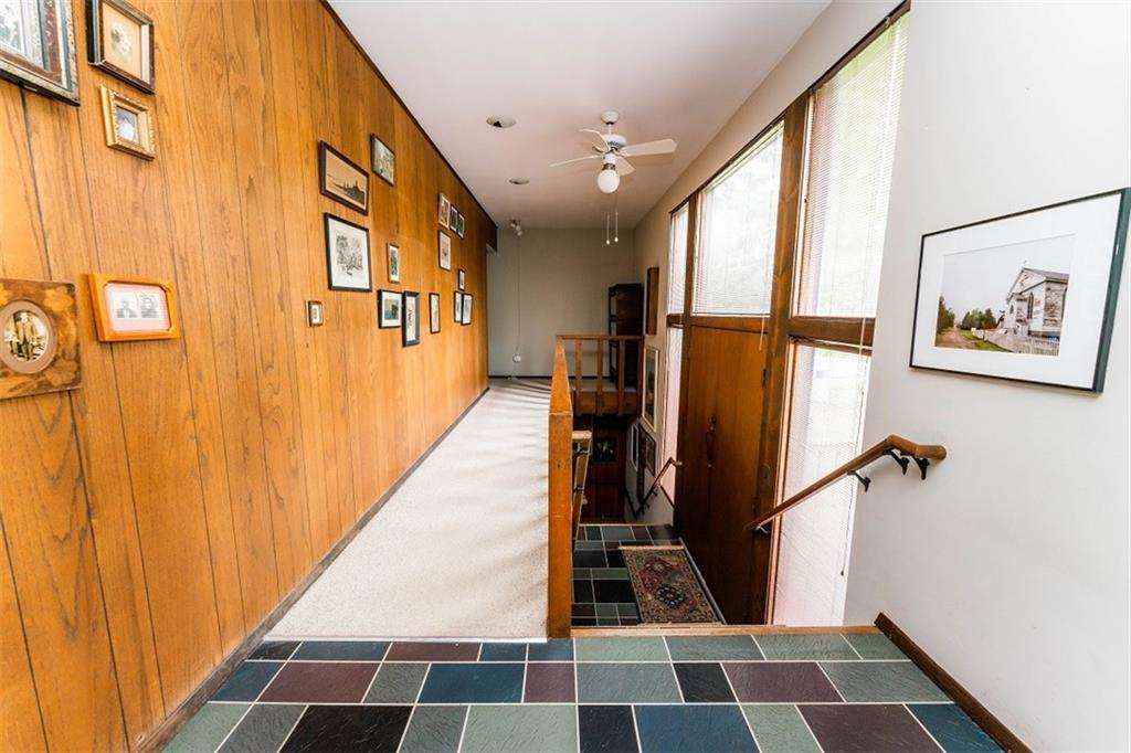 1000 Indian Springs Road Indiana, PA 15701 - Photo 3 of 22 a view of a hallway with a black and white checkered floor