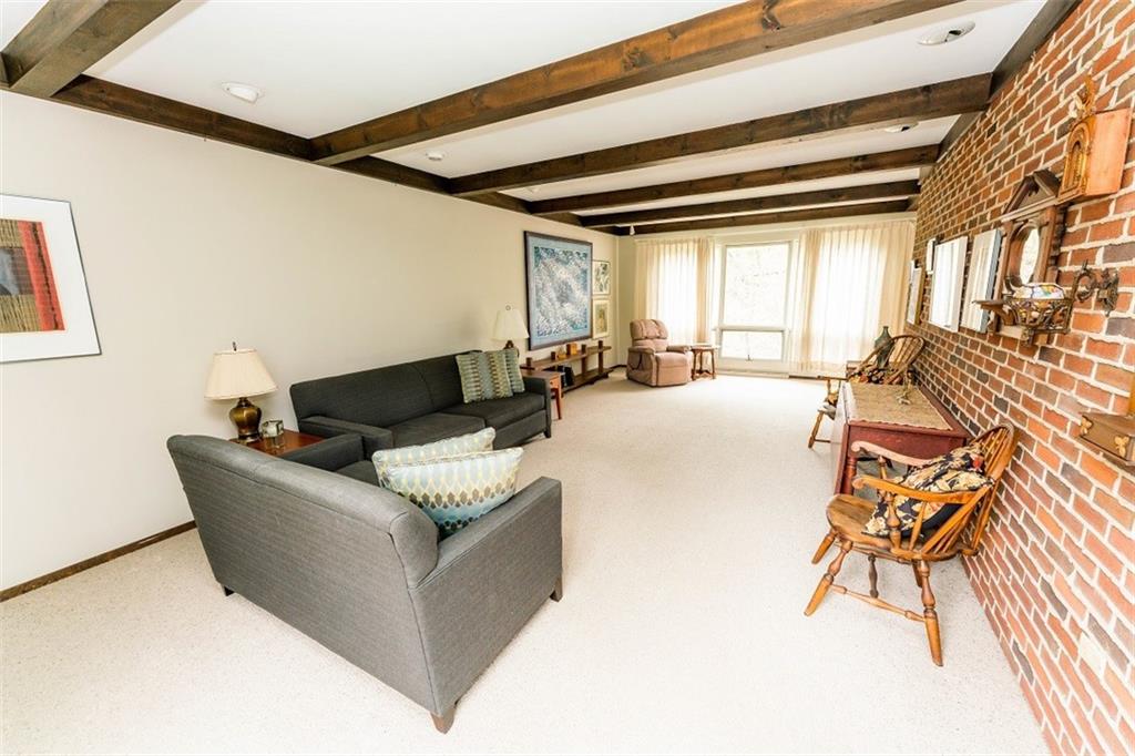 1000 Indian Springs Road Indiana, PA 15701 - Photo 4 of 22 a living room with furniture and floor to ceiling windows