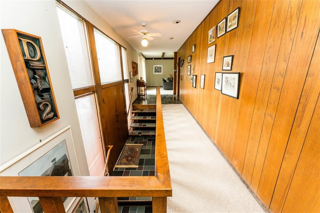 1000 Indian Springs Road Indiana, PA 15701 - Photo 8 of 22 a view of staircase with lots of frames on wall and a window
