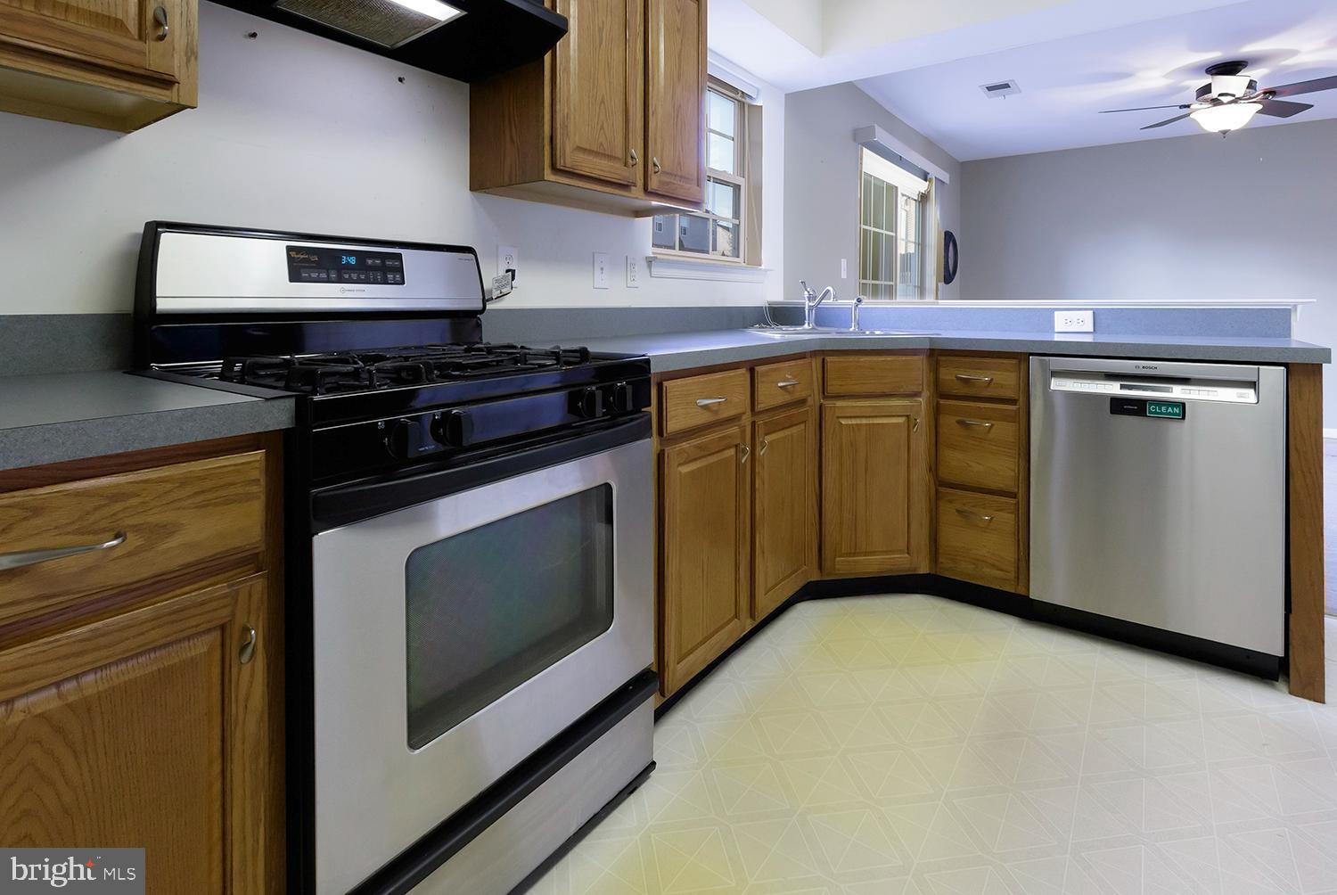 15 Greenbrook Drive Columbus, NJ 08022 - Photo 11 of 24 a kitchen with a stove and a microwave