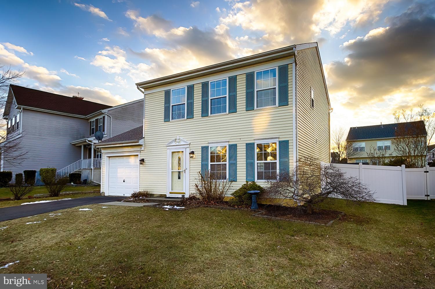15 Greenbrook Drive Columbus, NJ 08022 - Photo 3 of 24 a front view of house with yard and trees in the background