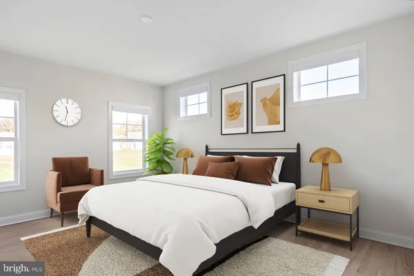 a bedroom with bed and window