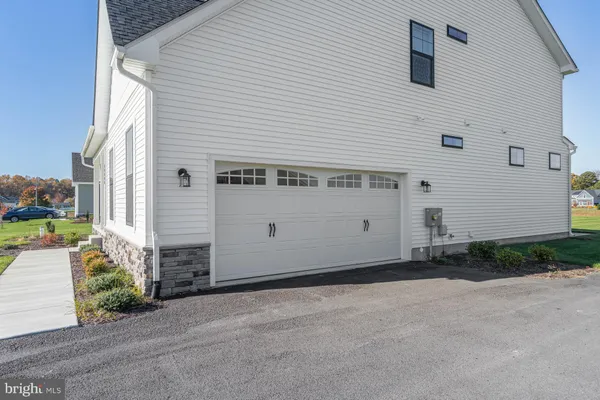 a view of a house with a garage