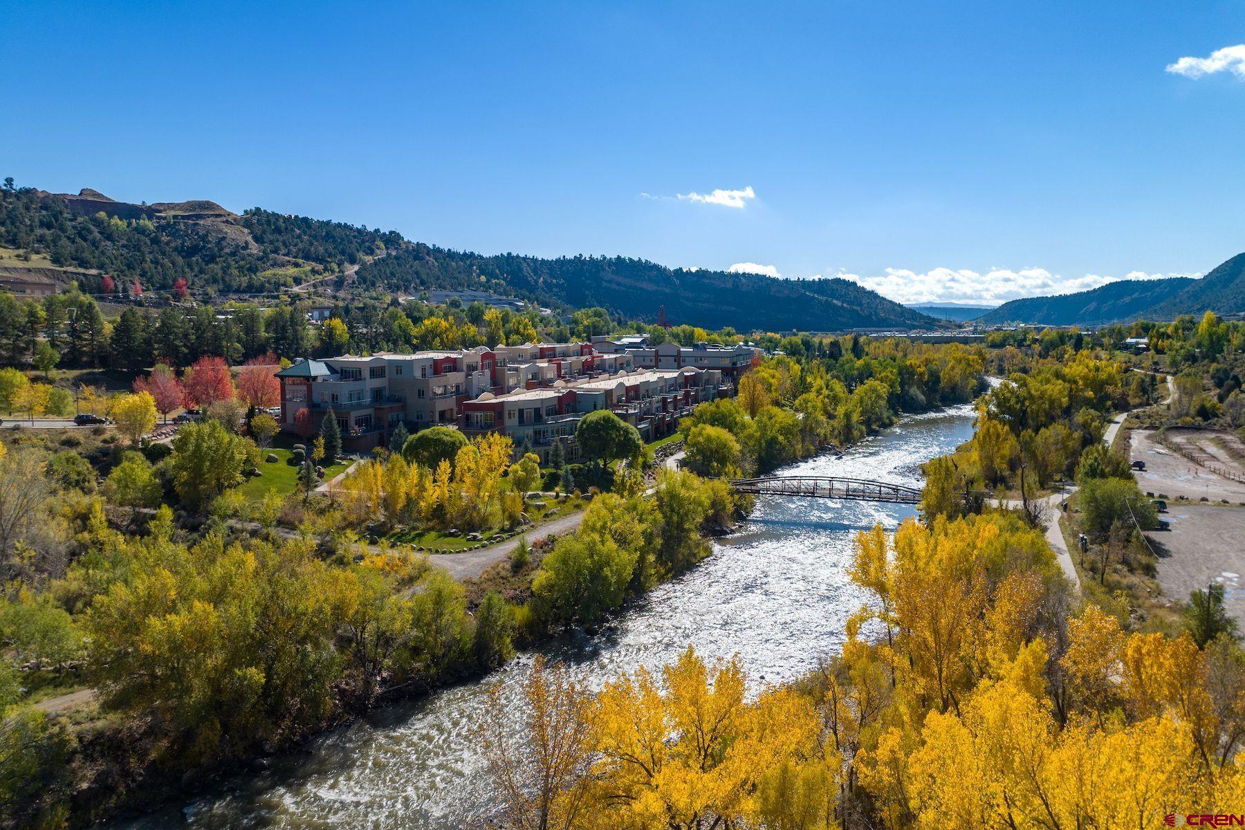 555 Rivergate Lane, Unit B482 Durango, CO 81301 - Photo 11 of 35 a view of a garden with mountains in the background