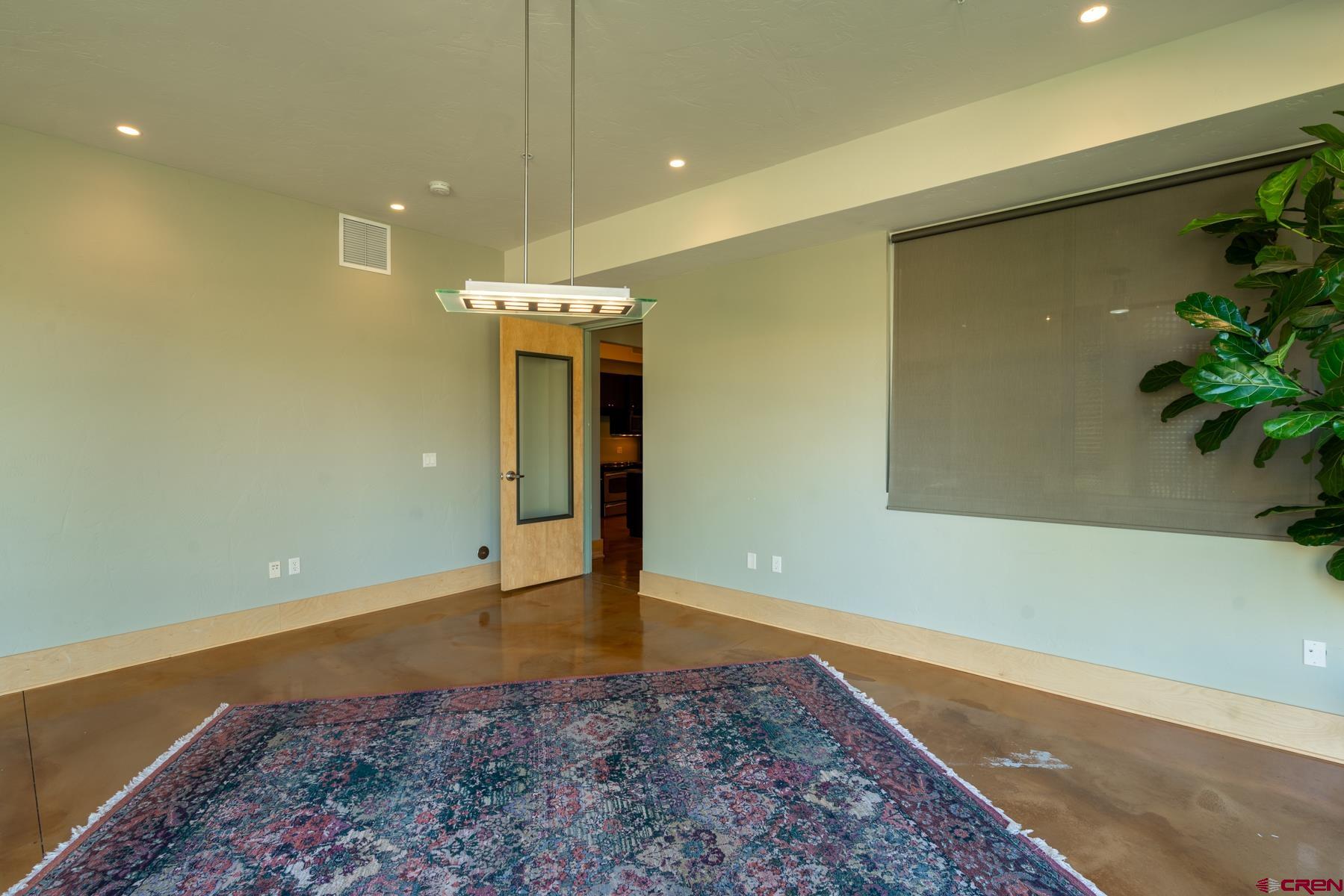 555 Rivergate Lane, Unit B482 Durango, CO 81301 - Photo 23 of 35 a view of a hallway with wooden floor