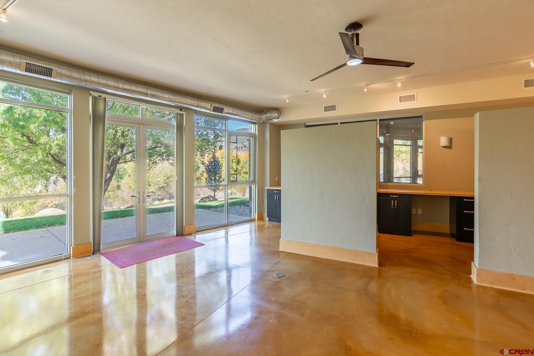 555 Rivergate Lane, Unit B482 Durango, CO 81301 - Photo 24 of 35 a view of a room with window and wooden floor