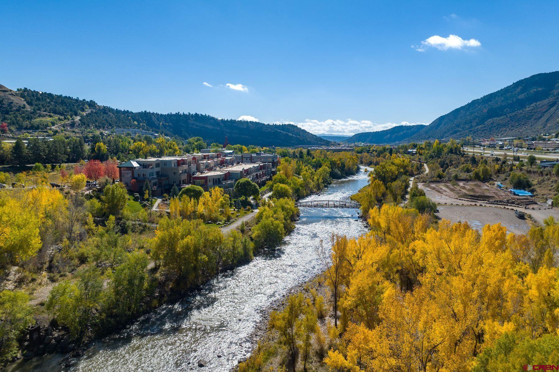 555 Rivergate Lane, Unit B482 Durango, CO 81301 - Photo 6 of 35 a view of a lake with a mountain