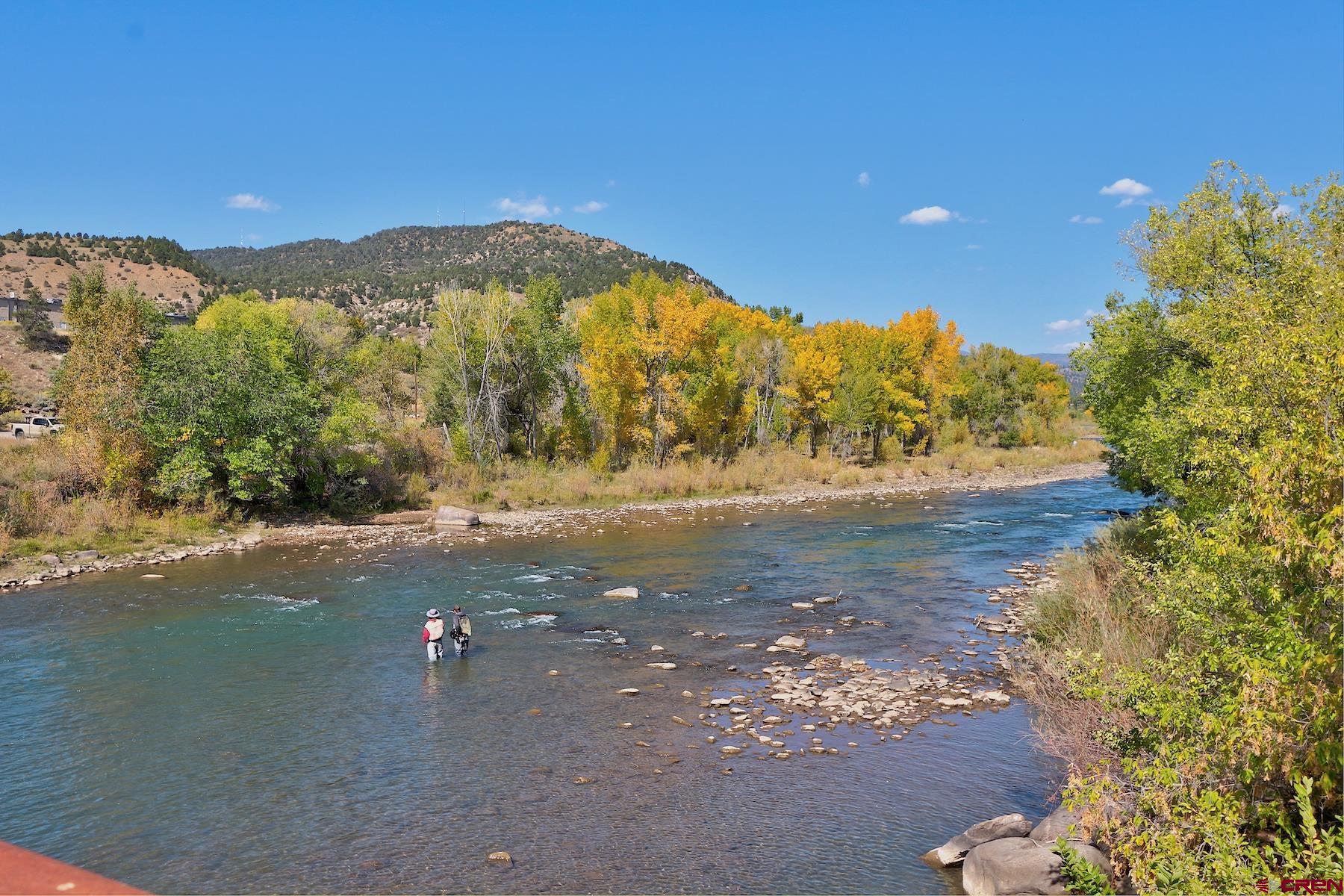 555 Rivergate Lane, Unit B482 Durango, CO 81301 - Photo 8 of 35 a view of a lake with a mountain