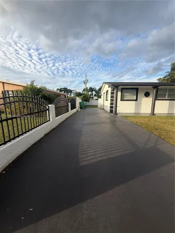 a view of a city street from a balcony