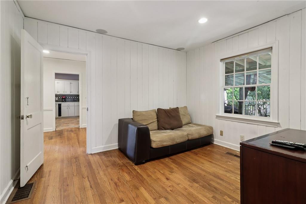 2267 Melante Drive Northeast Atlanta, GA 30324 - Photo 16 of 39 a living room with furniture and a fireplace