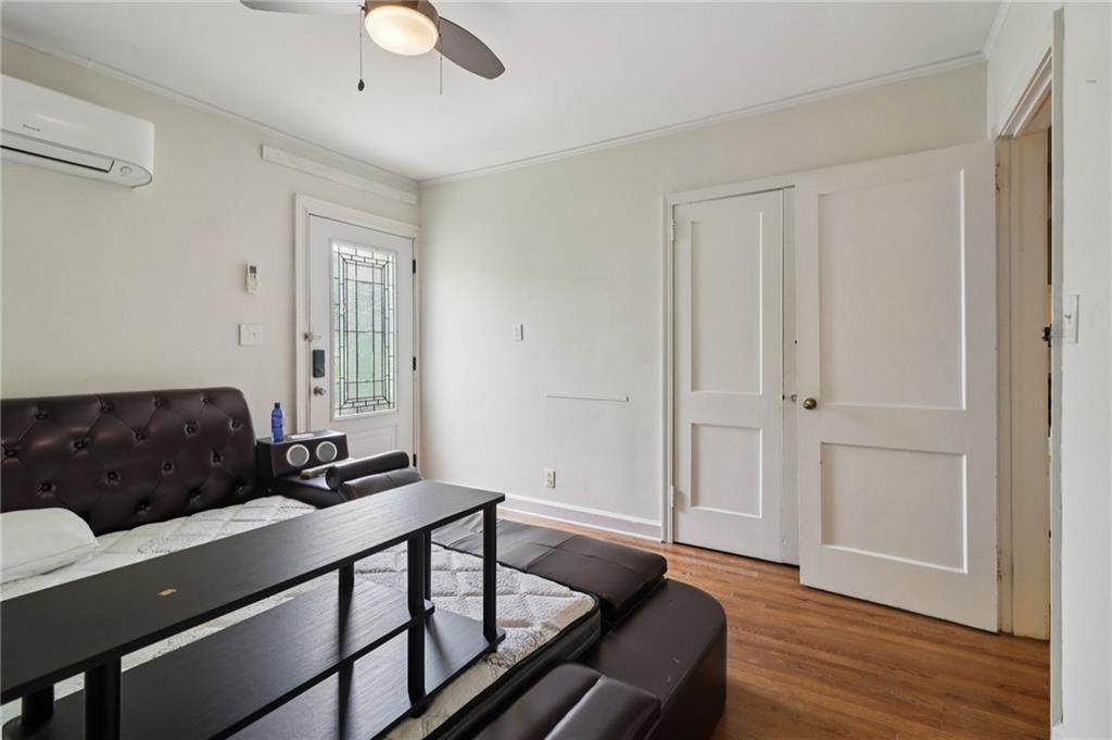 2267 Melante Drive Northeast Atlanta, GA 30324 - Photo 24 of 39 a living room with furniture and wooden floor