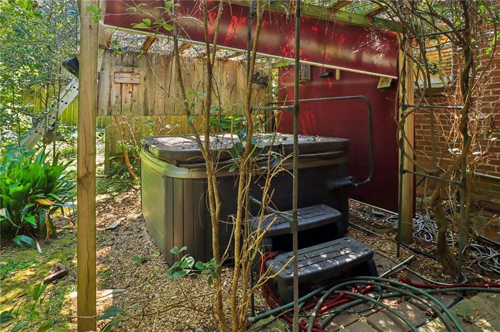 2267 Melante Drive Northeast Atlanta, GA 30324 - Photo 32 of 39 a view of a balcony with chairs and potted plants