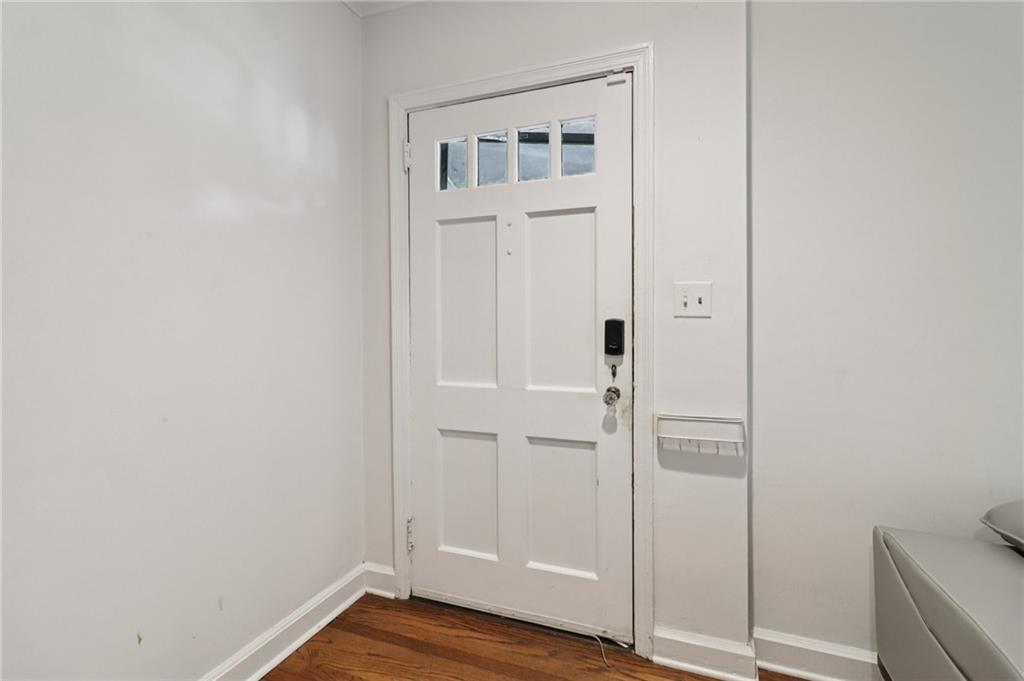 2267 Melante Drive Northeast Atlanta, GA 30324 - Photo 5 of 39 an empty room with wooden floor