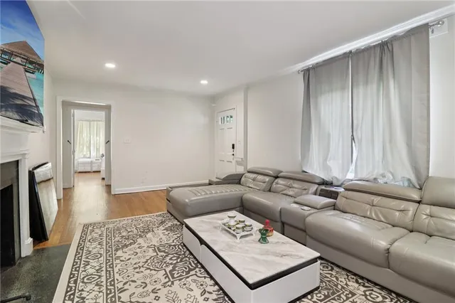 a living room with furniture and a couch