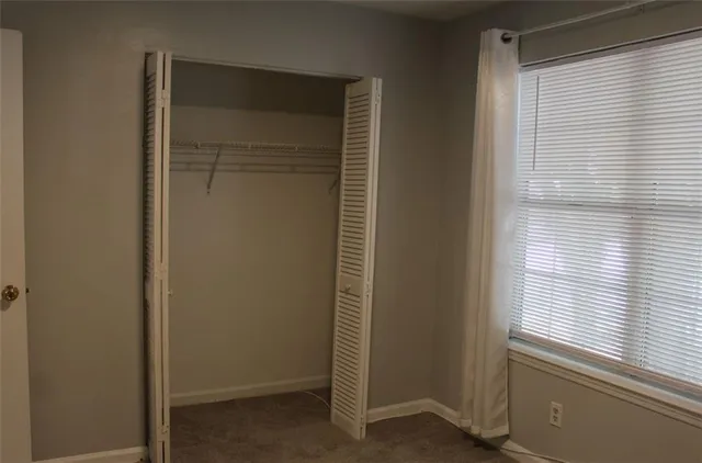 a view of a door and a window