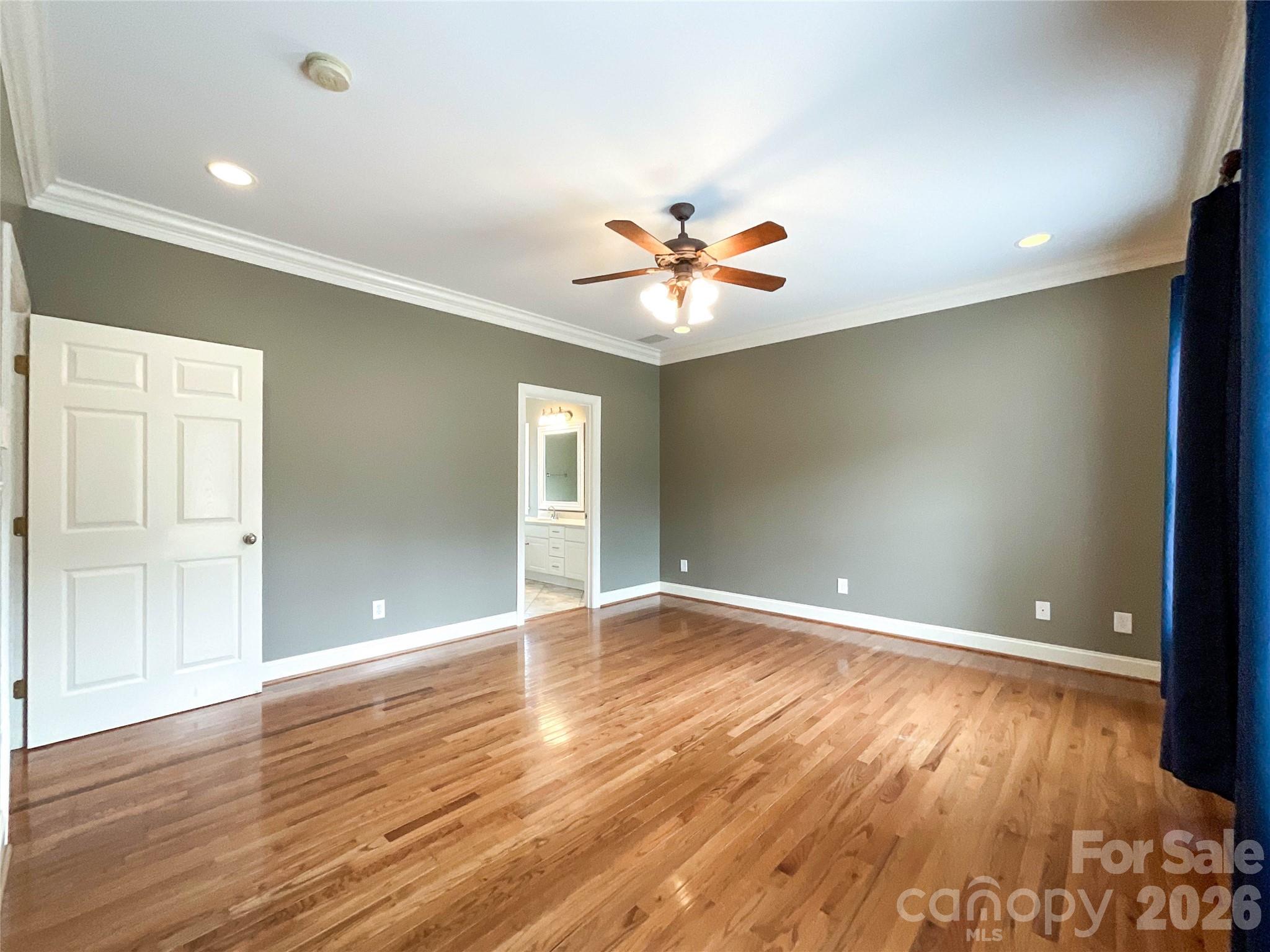 62 Will Evans Road Jefferson, SC 29718 - Photo 20 of 48 wooden floor in an empty room with a window