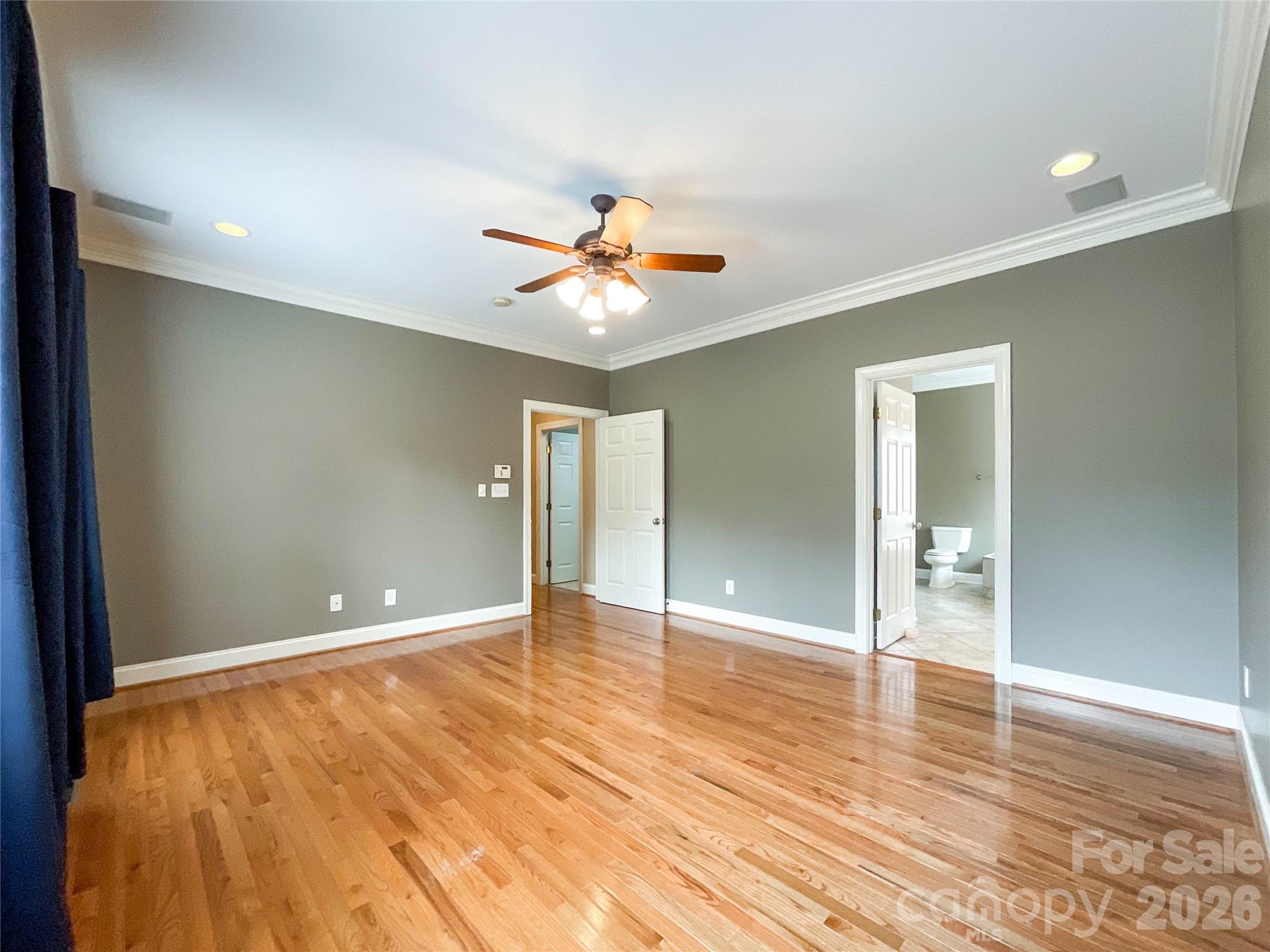 62 Will Evans Road Jefferson, SC 29718 - Photo 21 of 48 wooden floor in an empty room with a window