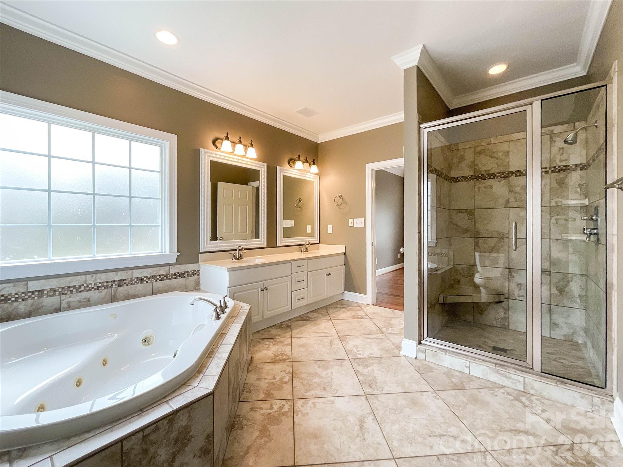 62 Will Evans Road Jefferson, SC 29718 - Photo 25 of 48 a bathroom with a bathtub and a shower