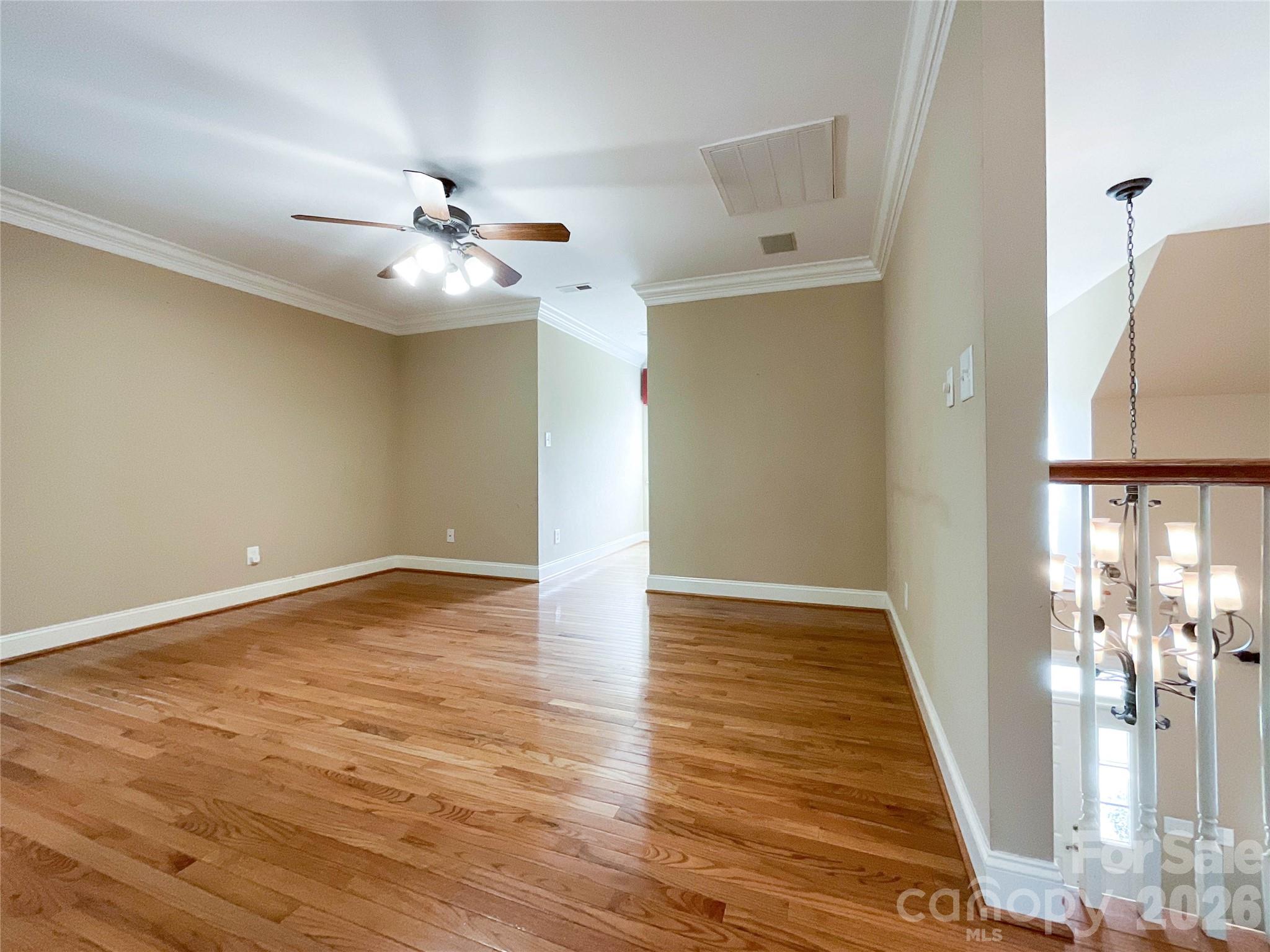 62 Will Evans Road Jefferson, SC 29718 - Photo 29 of 48 wooden floor in an empty room with a window